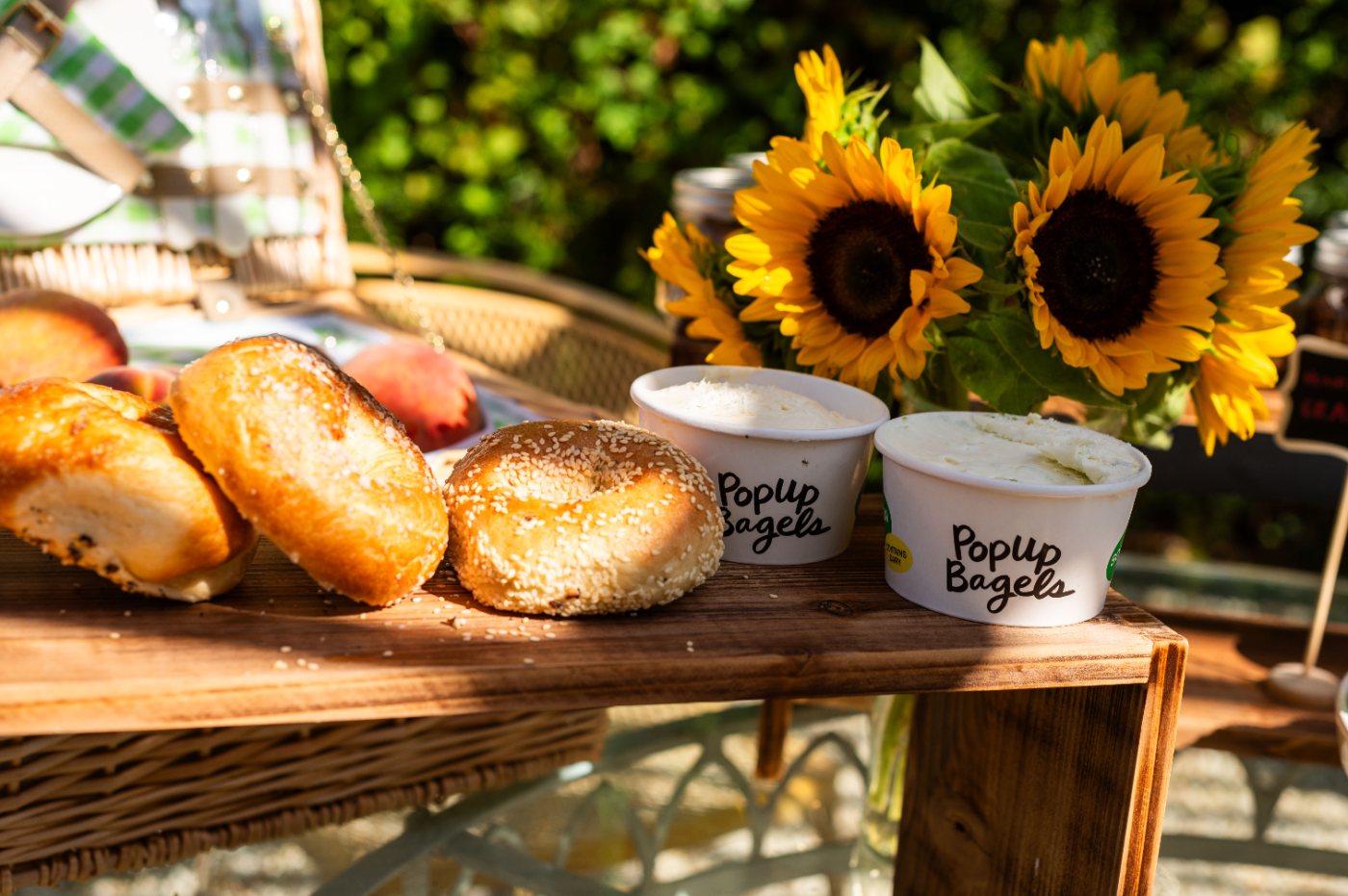 Bagels and cream cheese with sunflowers